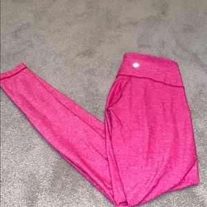 Lululemon barely worn pink leggings size 4